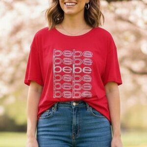 Plus size red blouse Bebe woman size 3X Color red, silver logo new